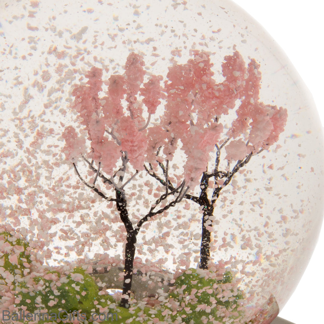 Spring Season Cool Snow Globe, close-up view.
