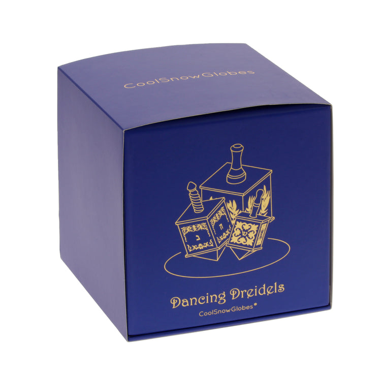 Dancing Dreidels Snow Globe blue gift box with gold lettering and dreidels graphic.