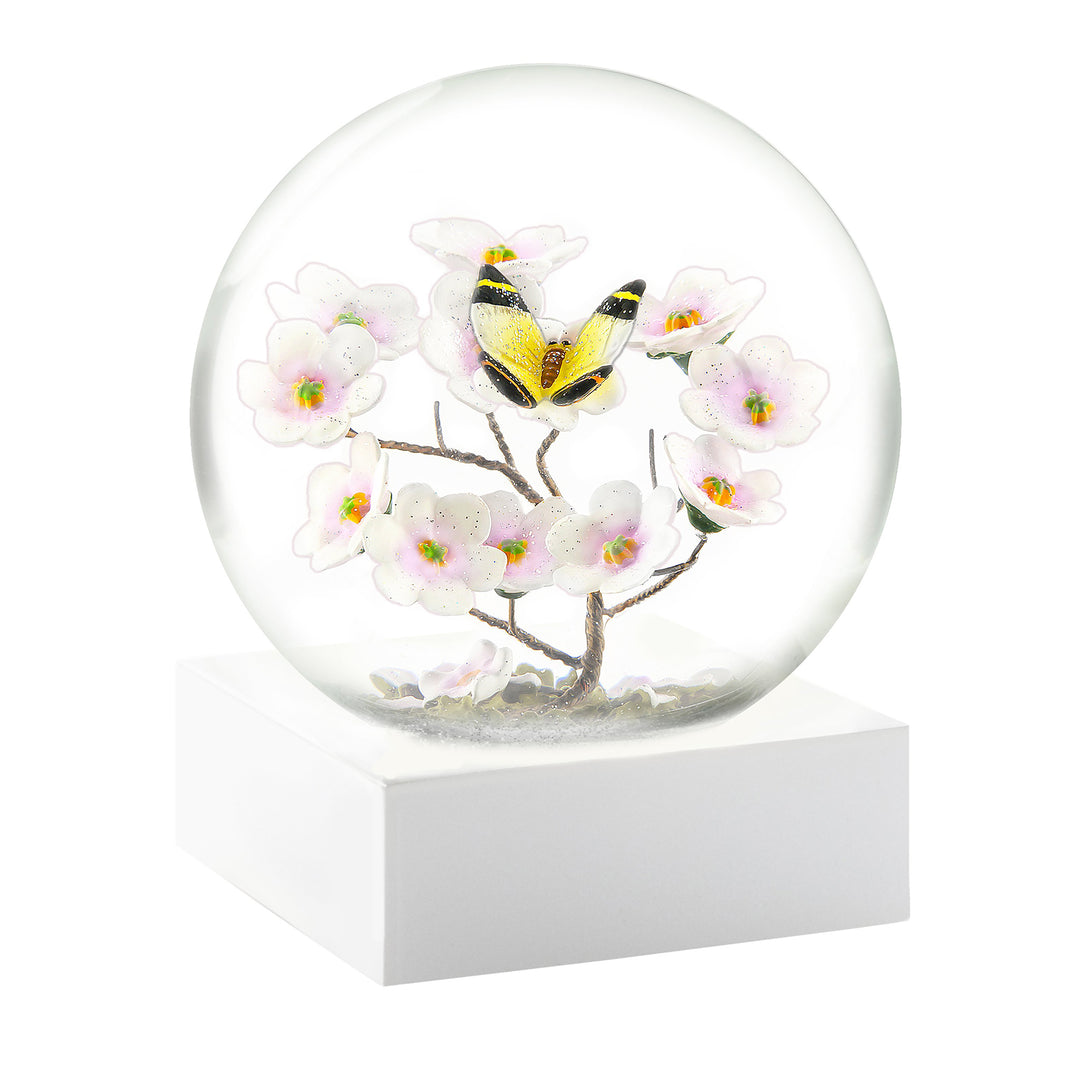 Butterfly Branch Cool Snow Globe, white base, front view.