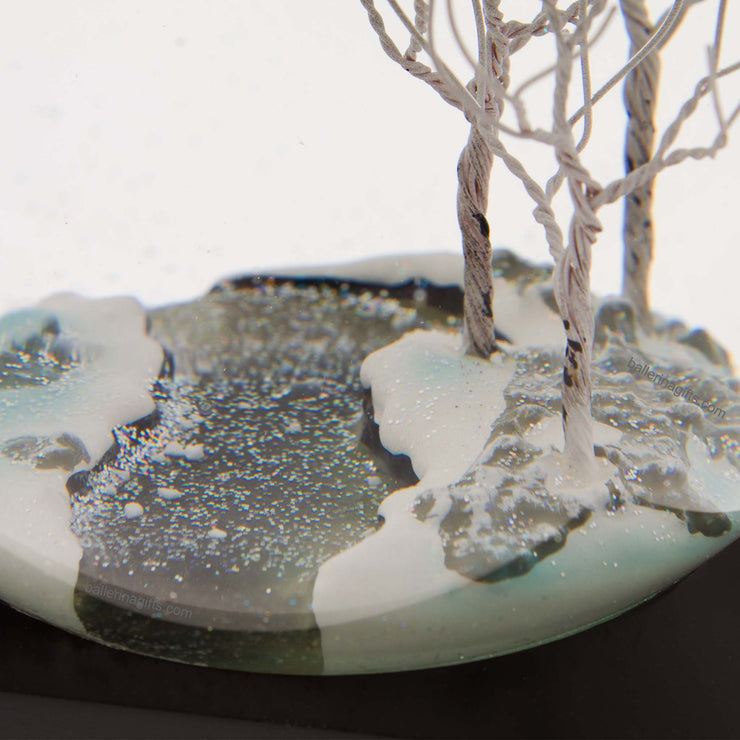 Winter Season Snow Globe by CoolSnowGlobes close up of river and trees.